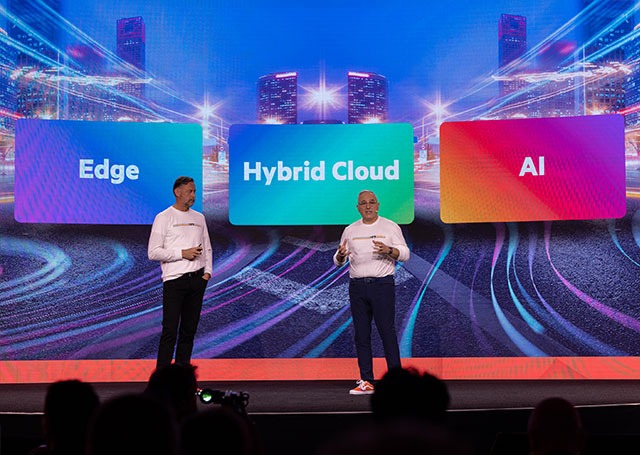 Antonio Neri and Phil Mottram presenting at Atmosphere